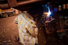 The truck drivers of India, photograph 34 of 43: the highway, the cab and the men who drive it.